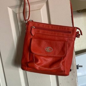 Woman hang bag orange